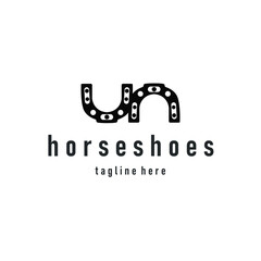 Horseshoe logo concept, illustration of a vintage retro symbol, a simple, modern Texas horseshoe concept and as a symbol of a product brand or template illustration.