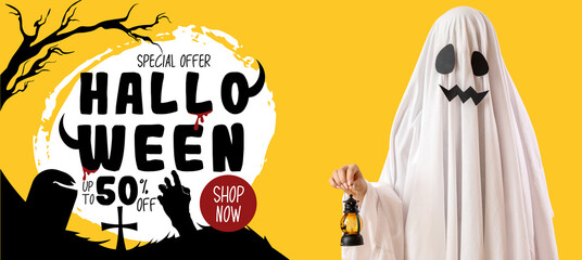 Person in Halloween costume of ghost with lantern on yellow background