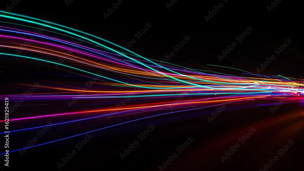 Poster colorful light streaks blur across a black background conveying motion and speed in a dynamic abstra