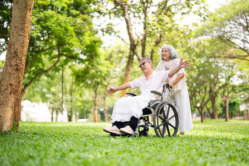Senior, couple and people with disability in park for fresh air, walking and enjoyment of...