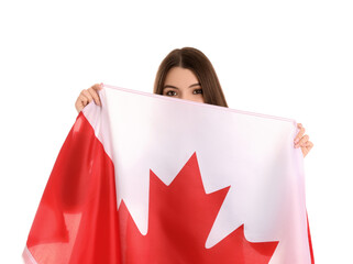 Young woman with flag of Canada on white background