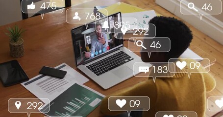 woman launching conference call and monitoring floating social media metrics during tech meeting - Powered by Adobe