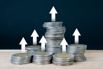 Financial investment business stock growth with stack of coins with trading chart in financial concepts. graph and stacks of coins for finance and business.