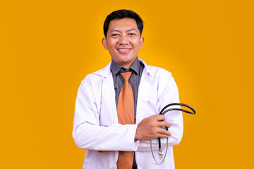Friendly Healthcare Expert Male Looking Directly At The Camera With A Reassuring Expression