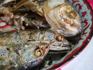 fried mackerel in a bowl