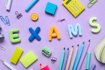 Composition with word EXAMS and different stationery on lilac background