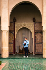 A man captured in front of Le Jardin Secret’s entrance