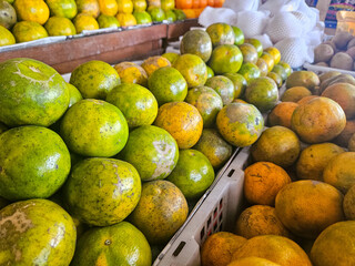 Vibrant fruit market scene urban setting food photography bustling environment close-up view fresh produce showcase