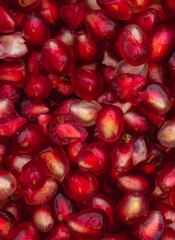 red pomegranate seeds background
