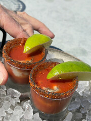 Closeup shot of Oyster Shooters in a glass on ice,