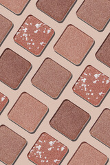 Cosmetics texture pattern, makeup palette vivid neutral color eye shadow, square eye powder swatches. Female cosmetic and beauty products, aesthetic minimal beauty photo, shimmer eyeshade, top view