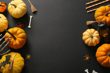 Composition with decorations and fresh pumpkins on dark background