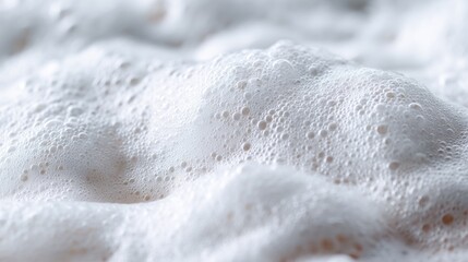 Close-up view of thick, bubbly white foam