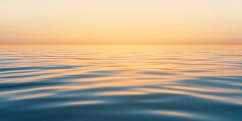 Obraz premium Serene Sunset Hues: Abstract Ocean Water at Golden Hour