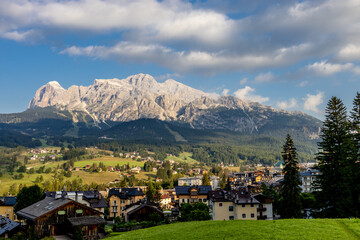 Fototapeta premium Cortina d'Ampezzo town Italy popular tourist summer and winter resort the capital of italian hiking in the Alps. Dolomites mountain resort breathtaking views outdoor. Home of winter Olympic games 2026