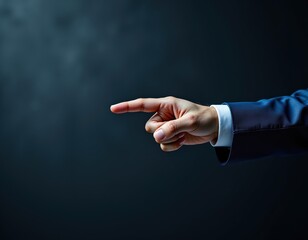 Elegant Businessman Pointing with Detail Against Dark Background