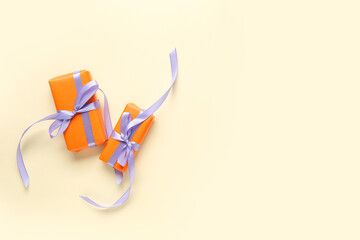 Halloween gifts on beige background. Top view