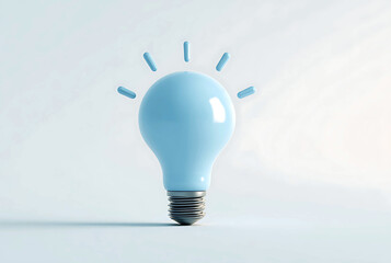 A blue lightbulb shines brightly, symbolizing a creative idea