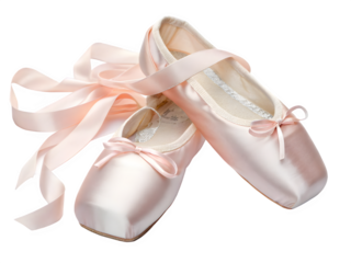 Pair of pink satin ballet pointe shoes with ribbons on a black background