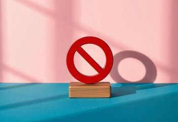 Red prohibition sign on wooden block against pink background
