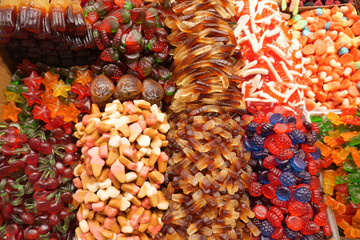Colorful candy assortment displayed in a market stall