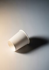 Minimalist paper cup on soft gradient background showcasing simplicity and design concept