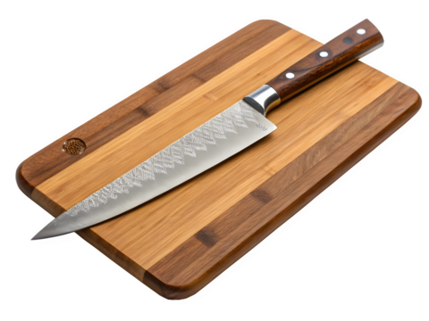 Sharp damascus steel chef knife resting on a wooden cutting board