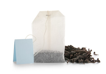 Dry tea leaves with bag isolated on white background, closeup