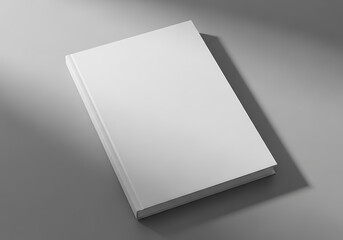 Clean white book cover template on gray surface under soft light shadow effects