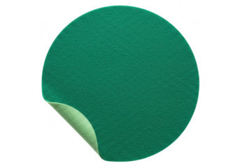 A green circular sticker with a peeled corner is isolated on a transparent background showcasing its textured surface