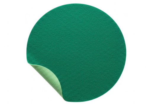 A green circular sticker with a peeled corner is isolated on a transparent background showcasing its textured surface
