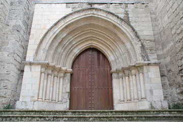 gate of a collegiate church (santa maria la mayor) in valladolid in spain 