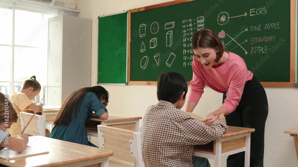 Poster smart teacher checking cute student homework while explaining idea at class. attractive instructor w