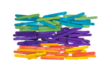 Colorful wooden craft sticks arranged in a vibrant pattern on a white background for arts and crafts, educational projects, or creative activities