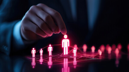 Empowering workforce allocation decisions, hand selects glowing figure among digital connections, symbolizing automation and innovation
