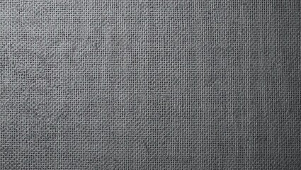 Close-up of textured grey fabric, ideal for backgrounds, textiles, or design projects requiring a neutral look.