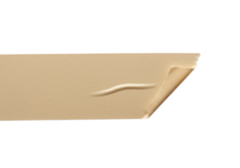 A closeup view of a beige adhesive tape strip with a peeling curled edge isolated on a transparent background