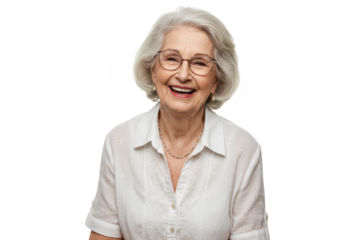 A happy senior woman with white hair and glasses is smiling warmly at the camera in a studio setting isolated on transparent background