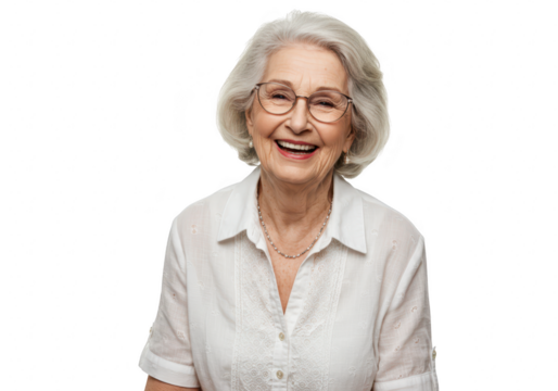 A happy senior woman with white hair and glasses is smiling warmly at the camera in a studio setting isolated on transparent background
