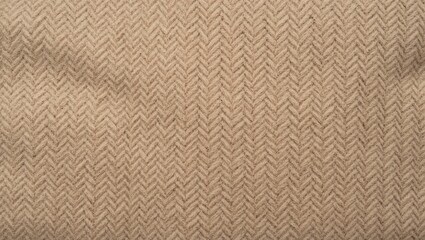 Textured beige fabric with a herringbone pattern, perfect for backgrounds and design projects.