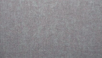 Textured gray fabric surface with subtle details, ideal for backgrounds, presentations, and design projects.