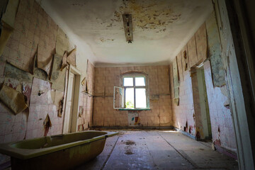 old abandoned house with a bathtub