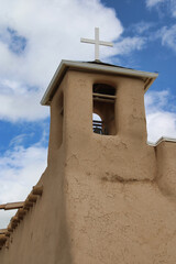 Cross Rising Above Bell Tower on Old Adobe Chapel at San Francisco de Asís Catholic Mission Church...