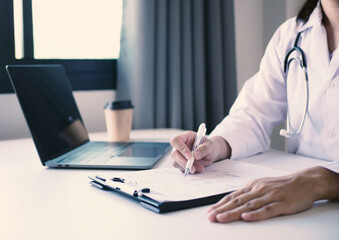 A female doctor who is an expert in explaining the test results to the patient, explains the...
