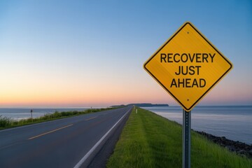 Find strength and hope on the road to recovery ahead with a yellow sign that illuminates the path to a brighter future, with serene ocean views