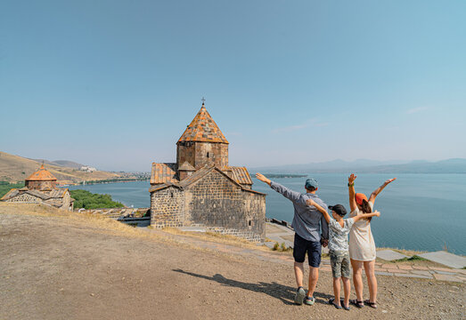 Family visit in ancient monastery called Sevanavank in Armenia 