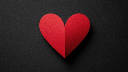 Obraz premium Red paper heart on dark background (1)