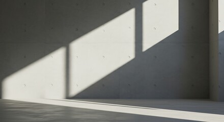 Fototapeta premium Minimalist interior with sunlight casting geometric shadows on a raw concrete wall and floor. Abstract architectural concept of light and space.