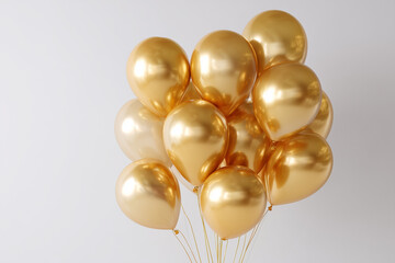 Golden balls on a white background. Background for a party or birthday party. A card for congratulations.
