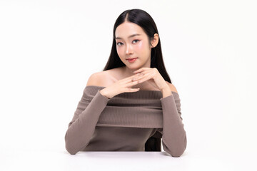 Beautiful young Asian woman with healthy and perfect skin on isolated white background. Facial and...